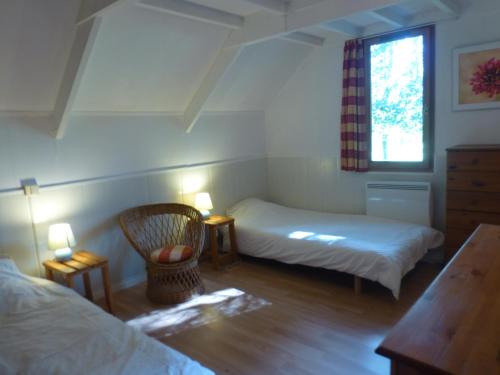 Postel nebo postele na pokoji v ubytování Gîte du Colombier