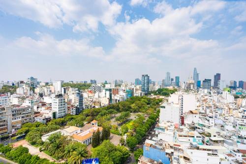 an aerial view of a city with tall buildings at International Plaza, District 1 in Ho Chi Minh City