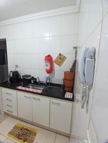 Kuchyň nebo kuchyňský kout v ubytování Quarto em Apto Compartilhado Bem Localizado AP 204