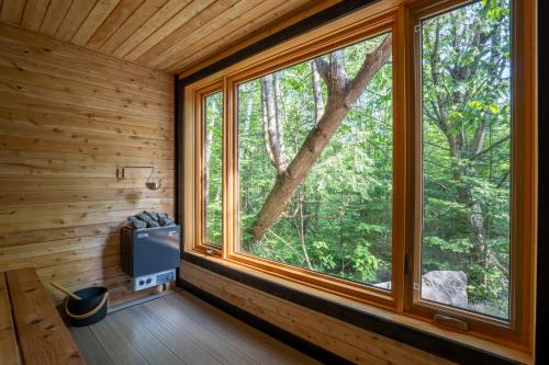 Κήπος έξω από το Évasion Nature Adstock - Sauna, Ski & Spa