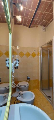 Ein Badezimmer in der Unterkunft Le Rondini