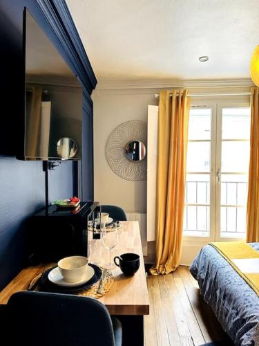 Кровать или кровати в номере Le Royal - Vieux Rennes