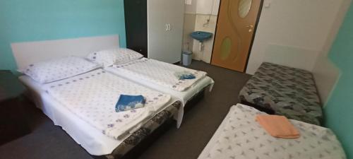 Postel nebo postele na pokoji v ubytování Ubytování Janami Rakvice
