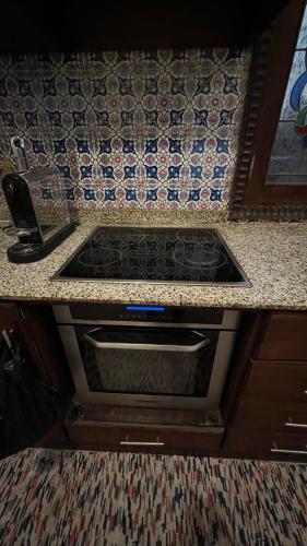 a kitchen counter top with a sink and a sink at Villa Barba Luxor in Luxor
