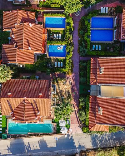 an overhead view of houses in a suburb at Corinthian Village in Vrachati