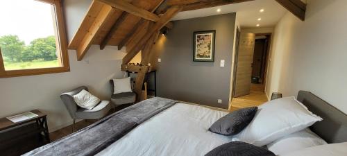 Postel nebo postele na pokoji v ubytování Le petit nid du Quercy