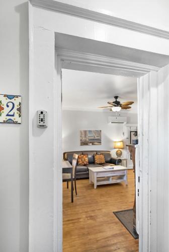 a living room with a couch and a ceiling fan at Villa Mulvey #2 in St. Augustine
