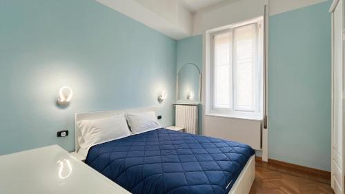 Postel nebo postele na pokoji v ubytování Center Apartment - Affitti Brevi Italia