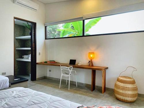 Postel nebo postele na pokoji v ubytování NEW beach villa w pool between Tayrona & Palomino