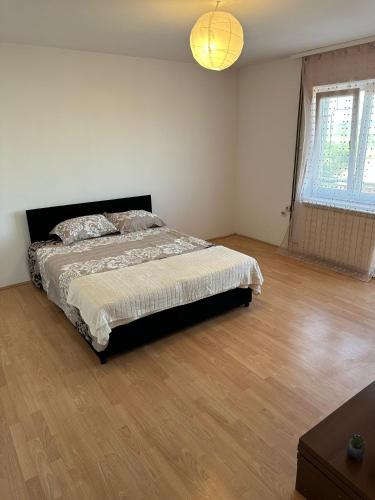 Postel nebo postele na pokoji v ubytování Apartman Fenix 2