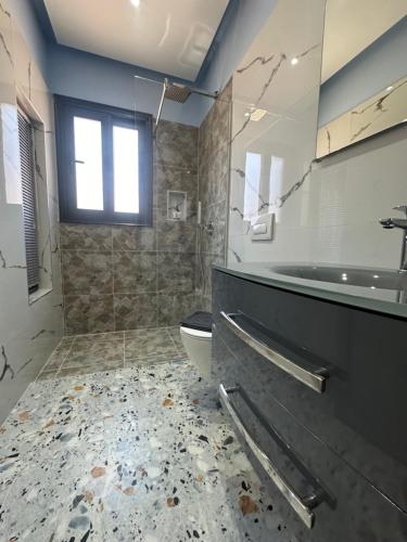 Koupelna v ubytování Sea Breeze Suites