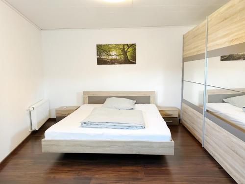 Ένα ή περισσότερα κρεβάτια σε δωμάτιο στο Vila Bösdorf Apartments