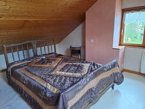 Postel nebo postele na pokoji v ubytování Maison de charme à Rougegoutte avec jardin et barbecue