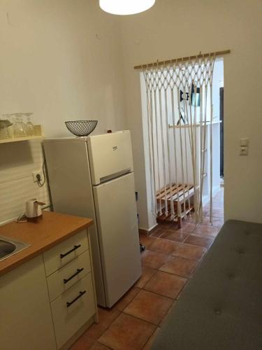 Kuchyň nebo kuchyňský kout v ubytování Achillion b&b