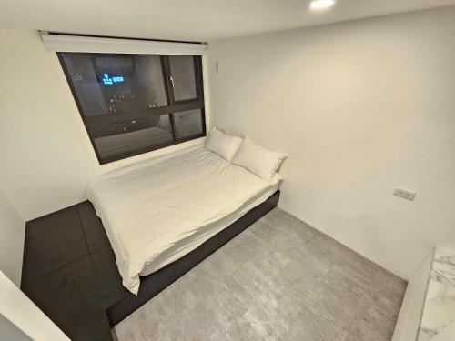 Una cama o camas en una habitación de 礁溪楓禾Maple
