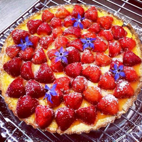 a strawberry pie with blue stars on top of it at Parc Hotel Casa Mia in Lazise