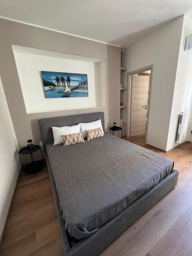 Postel nebo postele na pokoji v ubytování LaPignaVerde Suites