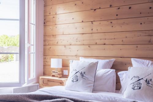 Postel nebo postele na pokoji v ubytování Le Clos du 5 - Appart Hotel Bagneres