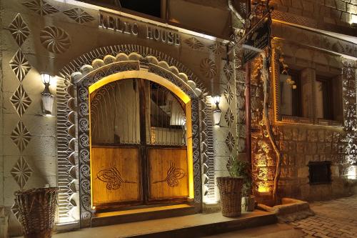 an entrance to a building with a wooden door at Relic House in Goreme
