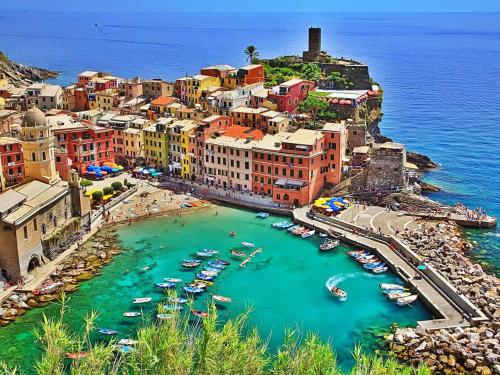 an aerial view of a harbor with boats in the water at Affittacamere Elisabetta in Vernazza