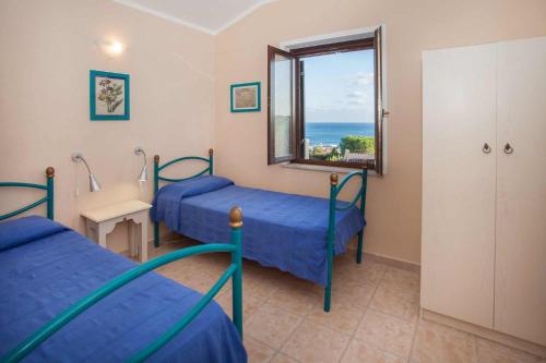 Posteľ alebo postele v izbe v ubytovaní Costa Est Apartments