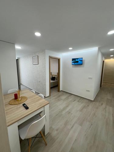 an office with a desk and chairs and a room at El Mirador De Casablanca in Alcantarilla