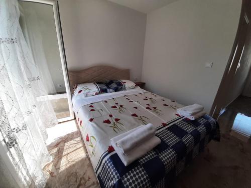 Đuričić Apartmaniにあるベッド