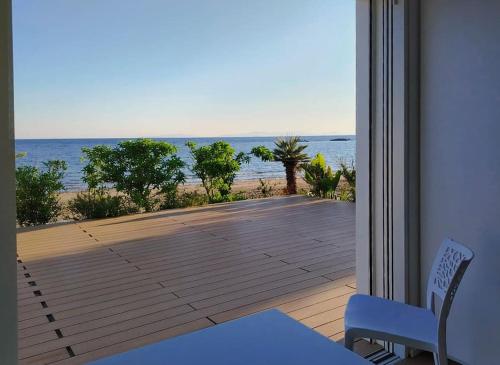 a balcony with a view of the ocean at "Le chic" sulla duna fronte mare in Follonica