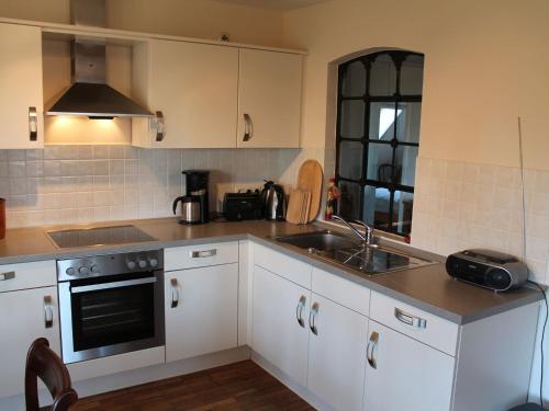 Dapur atau dapur kecil di Ferienwohnung Parkblick mit 3 Schlafzimmern