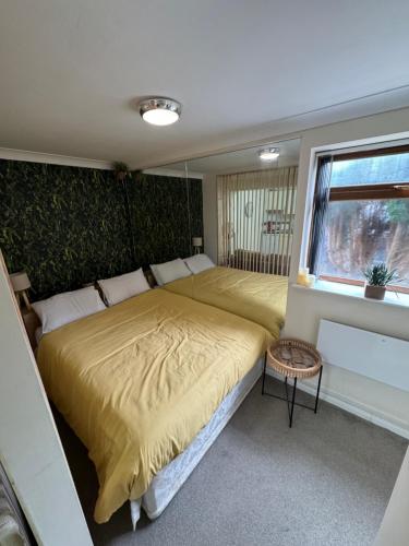 Ένα ή περισσότερα κρεβάτια σε δωμάτιο στο Modern Flat in Walsall UK