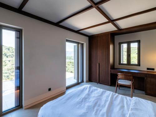 Letto o letti in una camera di Amphitheatro Boutique Hotel