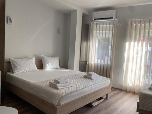 Postel nebo postele na pokoji v ubytování Valentina Apartament