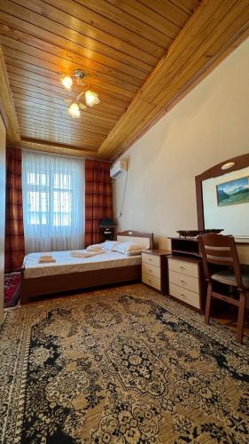 Una cama o camas en una habitación de Дом 14