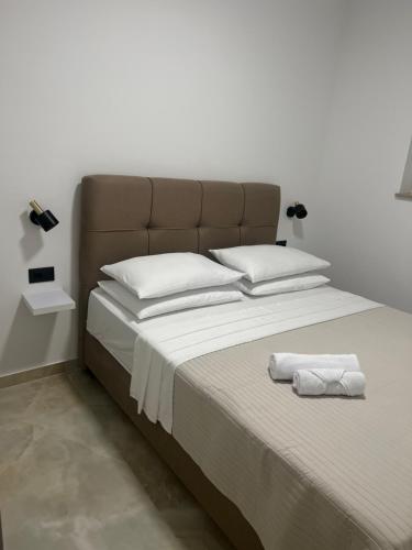 Ένα ή περισσότερα κρεβάτια σε δωμάτιο στο Luxury apartment Mani