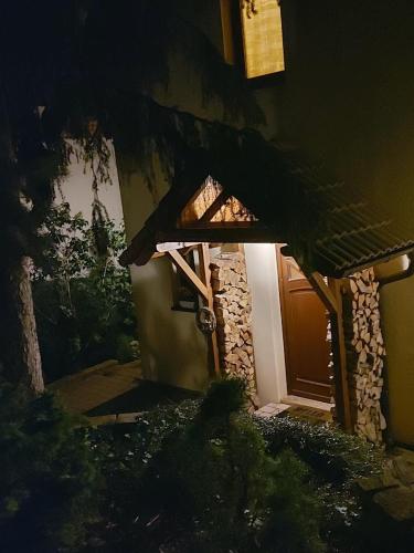 a small entrance to a house with a door at Chalet Červená Veža in Banka