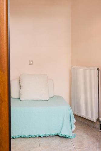 Postel nebo postele na pokoji v ubytování Artemis Central