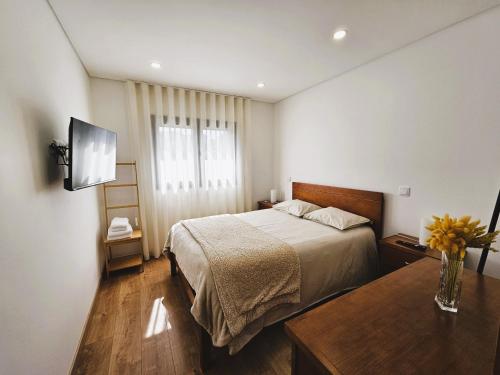 Postel nebo postele na pokoji v ubytování Casa do Moinho