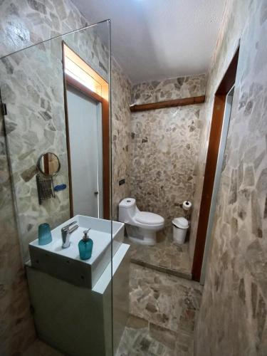 Ένα μπάνιο στο Hotel Casa Olga
