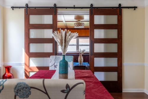 a dining room with a table and two bunk beds at The Italian Farmhouse in Cleveland Heights