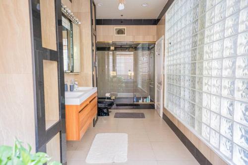 a bathroom with a sink and a toilet in it at Private Gramercy TownHouse 3BR 3BA with Terrace in New York