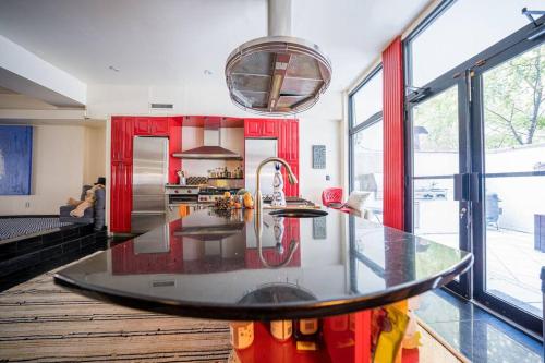 a kitchen with a large counter top in a room at Private Gramercy TownHouse 3BR 3BA with Terrace in New York