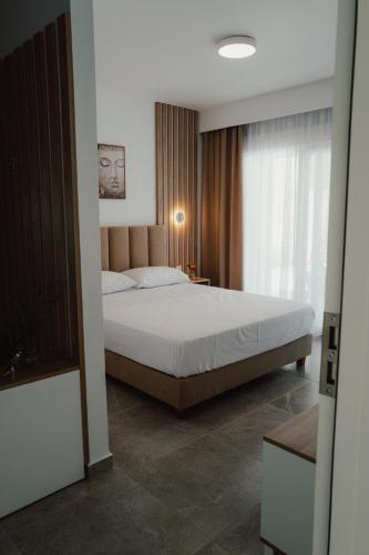 Llit o llits en una habitació de La mas - seaside flats