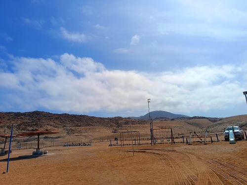 a dirt road in the middle of the desert at Hotel Puerto Inka in Chala