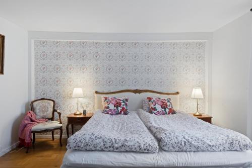 Postel nebo postele na pokoji v ubytování Kvistrom Inn - Kviströms Gästgiveri
