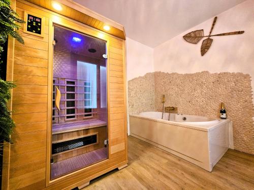 O baie la Tout confort ! Balnéo, Sauna, Cinéma, Climatisation, Parking, WiFi