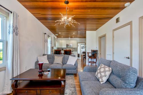 a living room with two couches and a table at Alameda luxury 2BR 2BA house, AC, near ferry to San Francisco, 2 free parking spaces in Alameda
