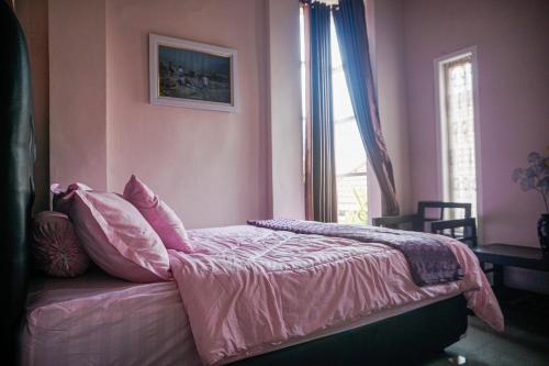 Postel nebo postele na pokoji v ubytování gigafa homestay