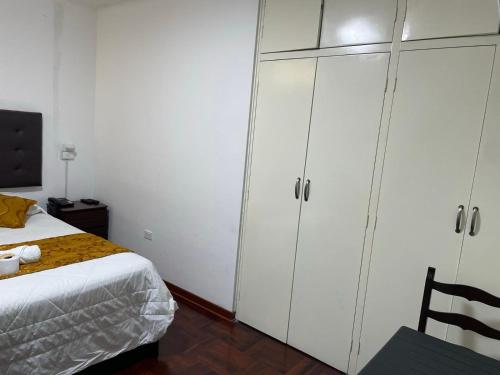 Postel nebo postele na pokoji v ubytování Lima HOUSE MILANI