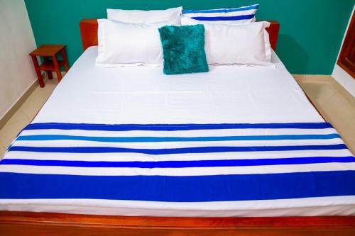 Una cama o camas en una habitación de JRéside Belle Verte 50m2 centre-ville