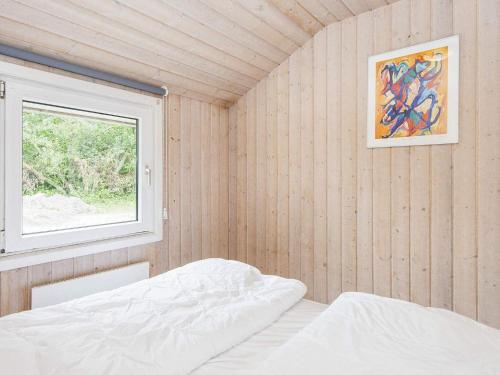 Ένα ή περισσότερα κρεβάτια σε δωμάτιο στο 12 person holiday home in Nordborg